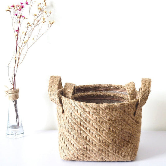 This Cloth Plant Pot & Organizer in Jute is depicted on a white background with a propagation jar at Earth to Daisy