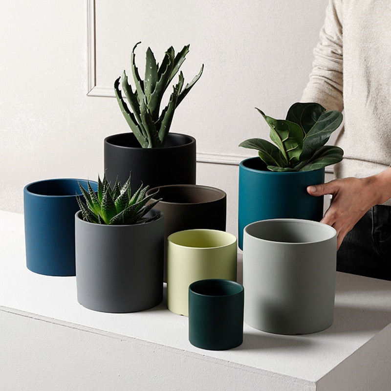 This Simple Ceramic Planter - 5.5" from Earth to Daisy is perfect for the modern plant mom in her indoor jungle! #plantsmakepeoplehappy