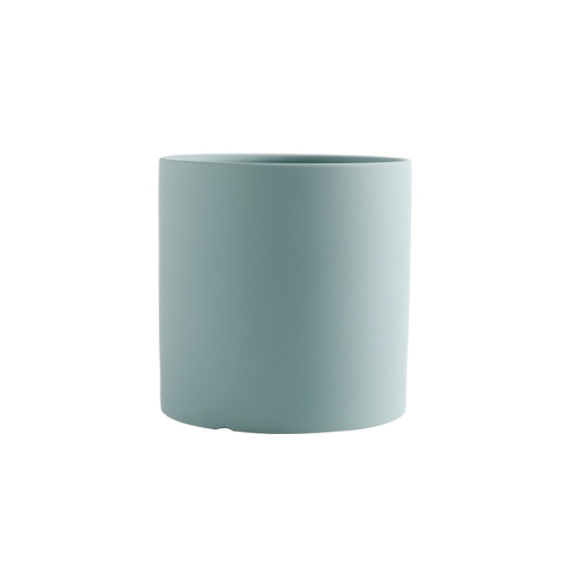 This Simple Ceramic Planter - 5.5" from Earth to Daisy is perfect for the modern plant mom in her indoor jungle! #plantsmakepeoplehappy