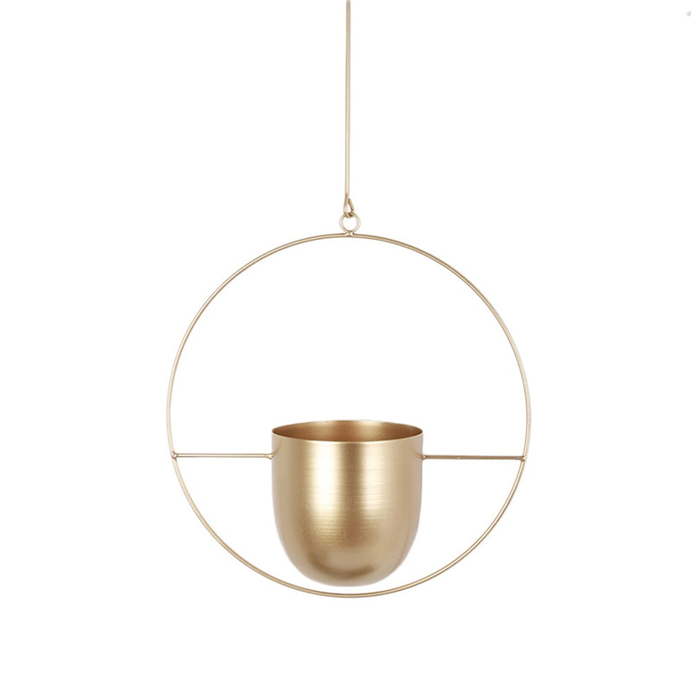 This Gold Hoop Hanging Planter from Earth to Daisy is perfect for the modern plant mom in her indoor jungle! #plantsmakepeoplehappy