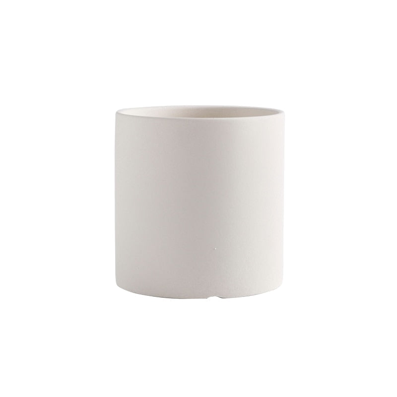 This Simple Ceramic Planter - 5.5" from Earth to Daisy is perfect for the modern plant mom in her indoor jungle! #plantsmakepeoplehappy
