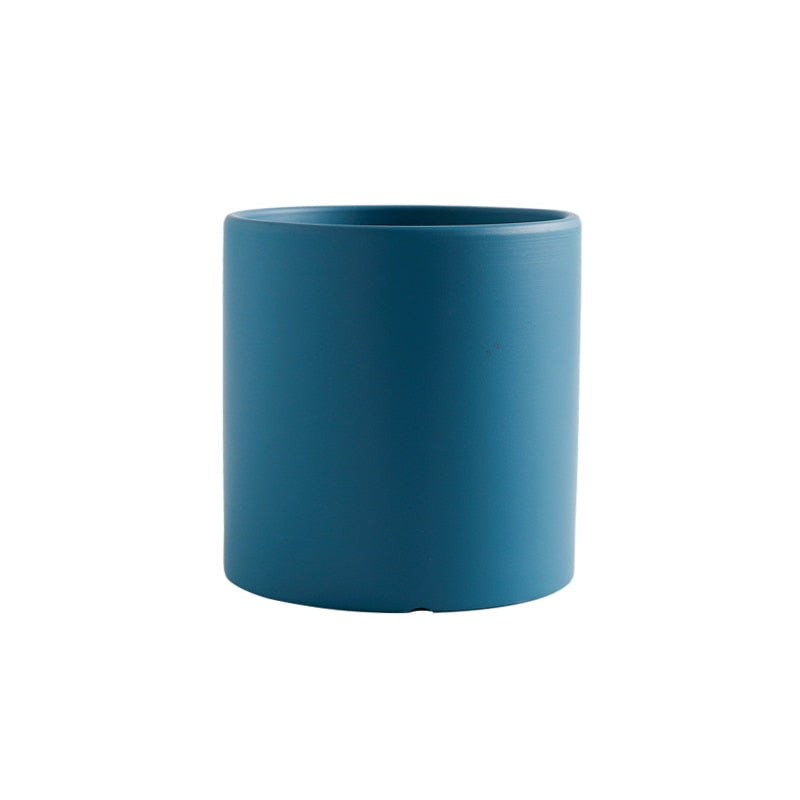 This Simple Ceramic Planter - 5.5" from Earth to Daisy is perfect for the modern plant mom in her indoor jungle! #plantsmakepeoplehappy