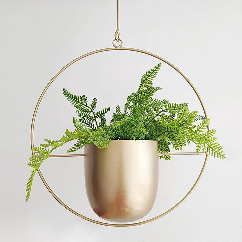 This Gold Hoop Hanging Planter from Earth to Daisy is perfect for the modern plant mom in her indoor jungle! #plantsmakepeoplehappy