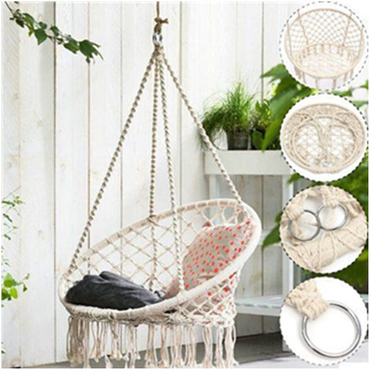 This Hanging Rattan Chair from Earth to Daisy is perfect for the modern plant mom in her indoor jungle! #plantsmakepeoplehappy