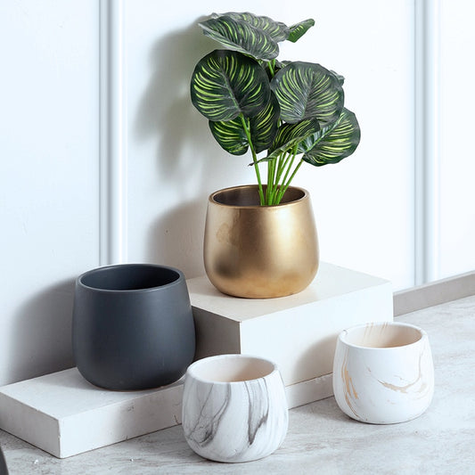 This Modern Ceramic Flower Pot - Small from Earth to Daisy is perfect for the modern plant mom in her indoor jungle! #plantsmakepeoplehappy