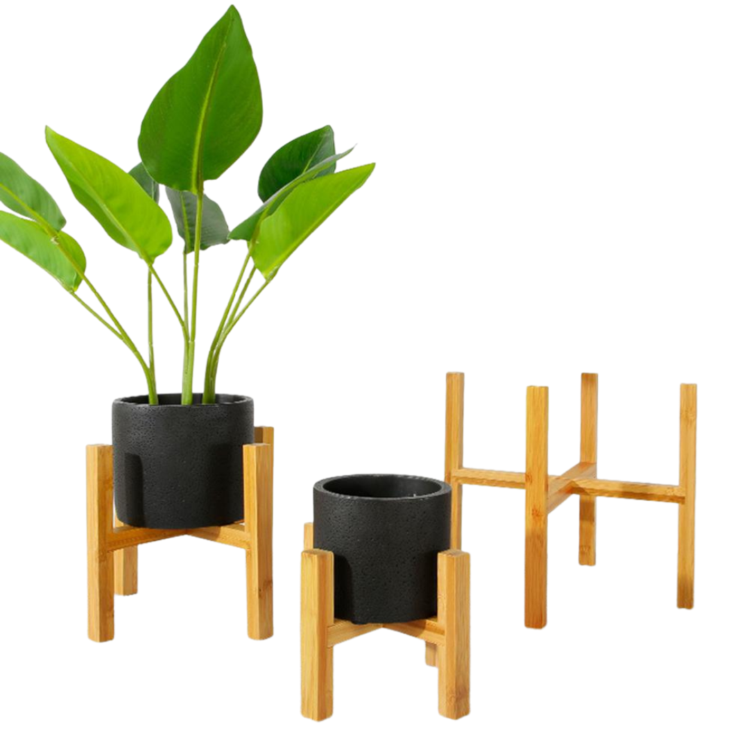 This A Bamboo Plant Stand from Earth to Daisy is perfect for the modern plant mom in her indoor jungle! #plantsmakepeoplehappy