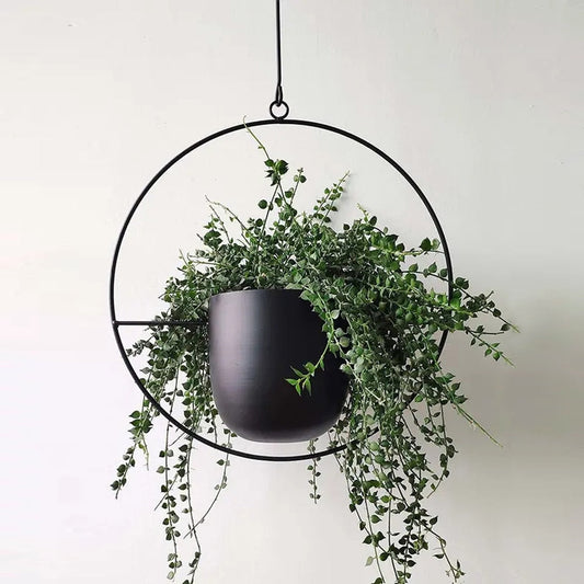 This Black Hoop Hanging Planter from Earth to Daisy is perfect for the modern plant mom in her indoor jungle! #plantsmakepeoplehappy