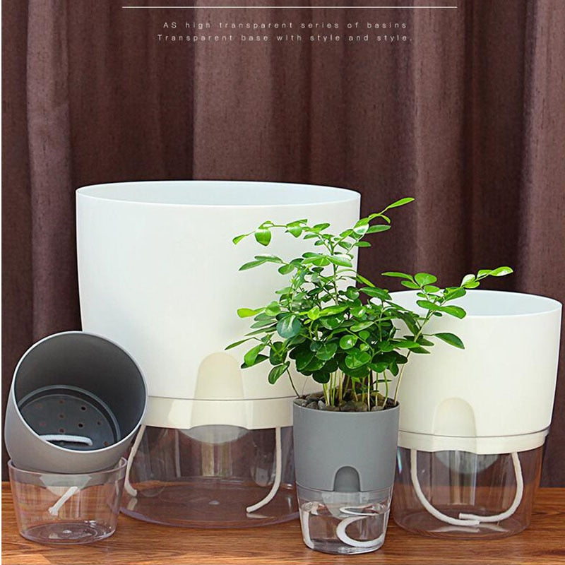 This Grey Semi-Hydro Pots from Earth to Daisy is perfect for the modern plant mom in her indoor jungle! #plantsmakepeoplehappy